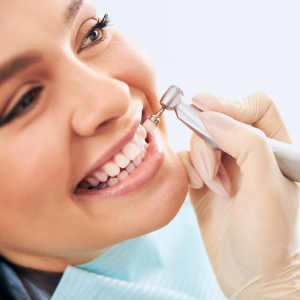 Patient receives a professional teeth cleaning at Arizona Smiles in Gilbert, AZ, ensuring a healthy and bright smile.
