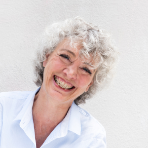 Older woman enjoys her refreshed, confident smile after expert dental care at Arizona Smiles in Gilbert, AZ.