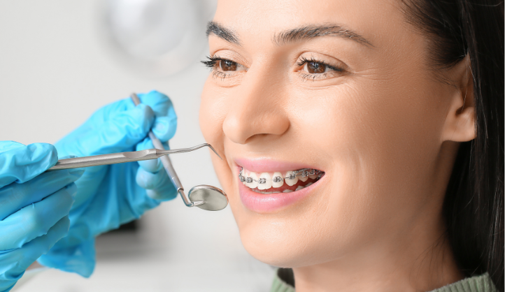 Adult orthodontic consultation in Gilbert, AZ where the orthodontist reviews treatment options with the patient.