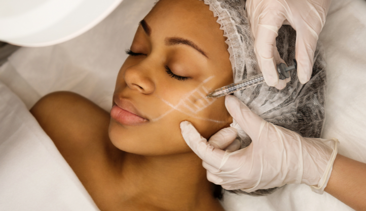 Doctor and patient review dermal filler appointment booking and treatment plan at Arizona Smiles, a leading clinic in Gilbert, AZ.